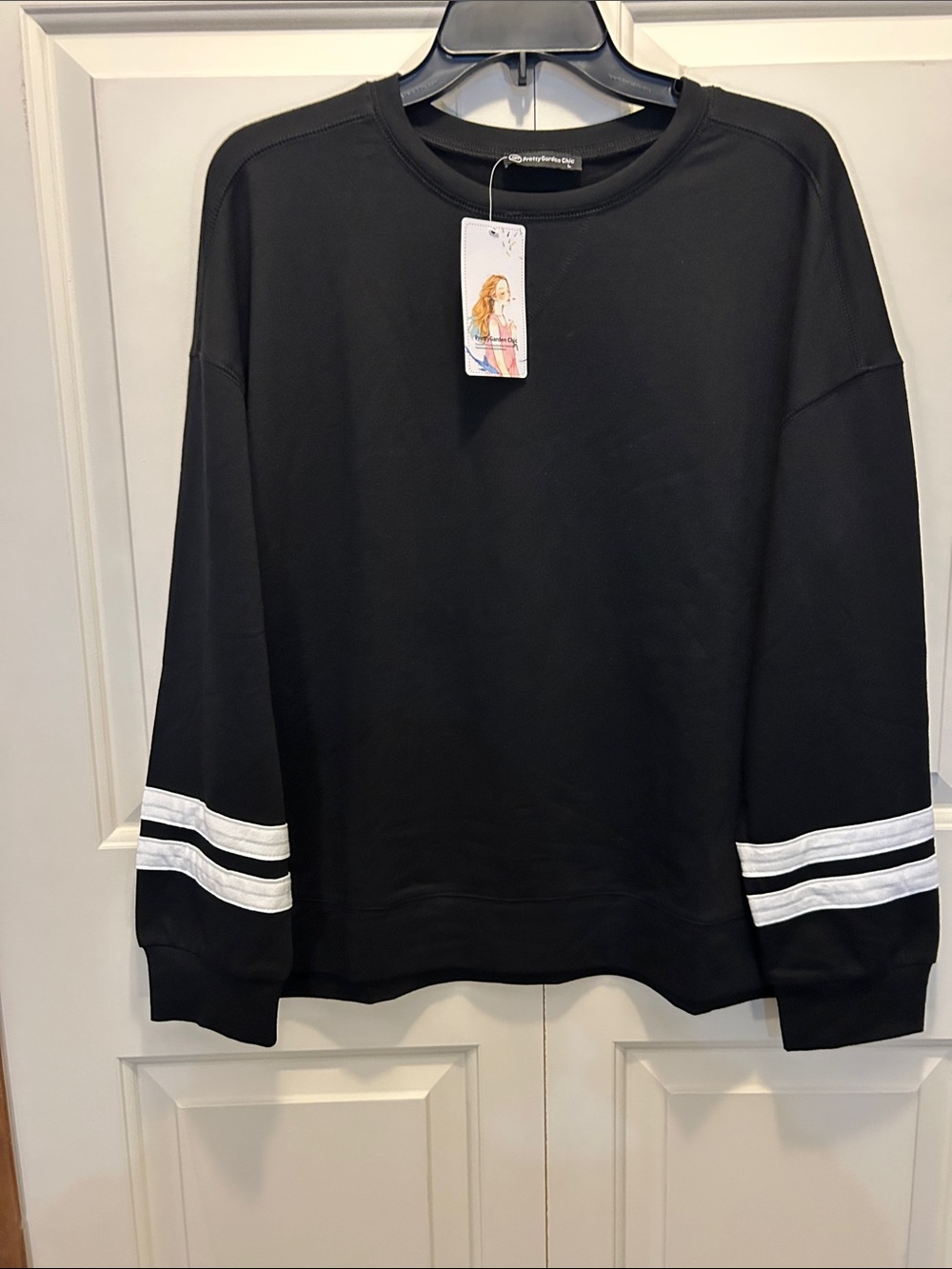 Pretty Garden Chic - Woman’s Black Crewneck Sweater with White Sleeve Stripes